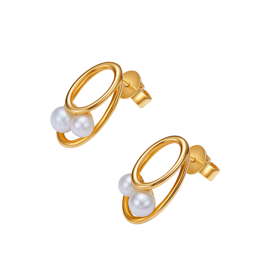 Gold hoop earrings with pearl beads on a white background