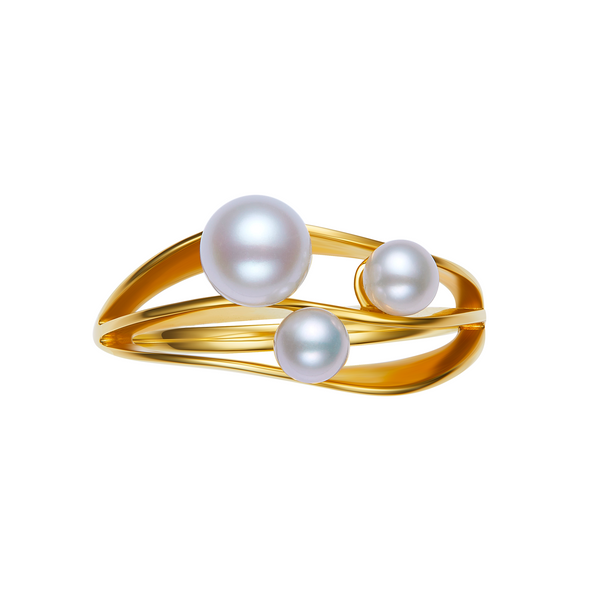 Gold ring with three pearls on a white background