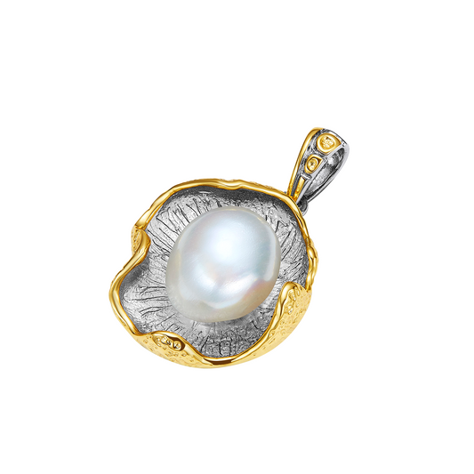 Pearl pendant with gold and silver design on a white background