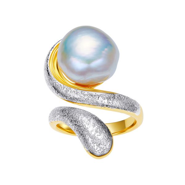 Gold and silver ring with a pearl on a white background