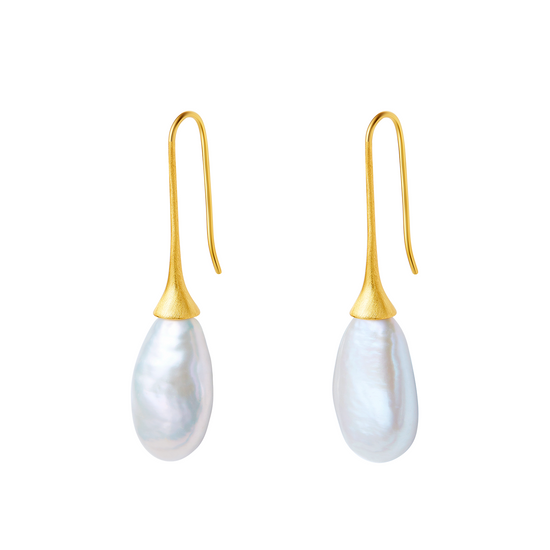 Pearl earrings with gold hooks on a white background