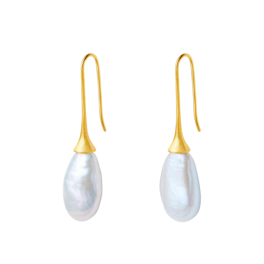Pearl earrings with gold hooks on a white background