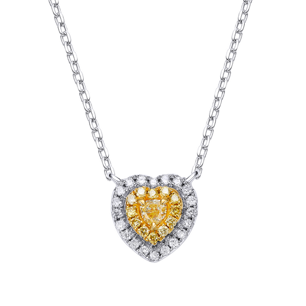 Heart-shaped diamond pendant with yellow center and white border on a chain against a white background