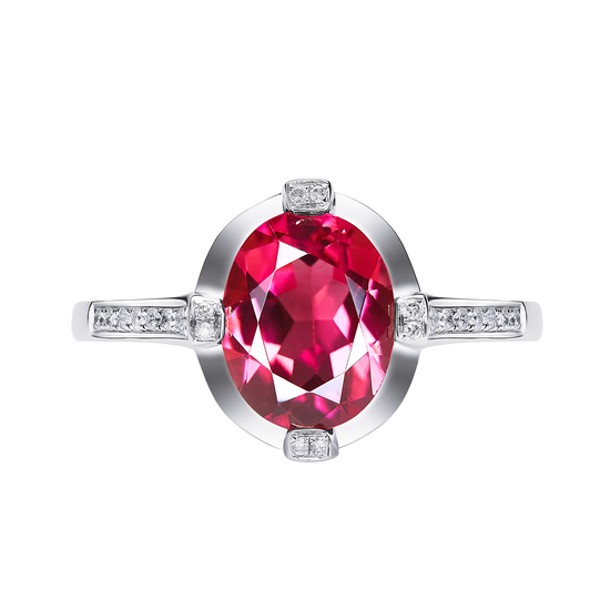 Ring with a large red gemstone and smaller diamonds on a white background