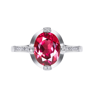 Ring with a large red gemstone and smaller diamonds on a white background