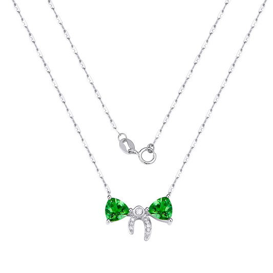 Necklace with green gemstone bow pendant on a white background