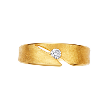 Gold ring with a diamond on a white background
