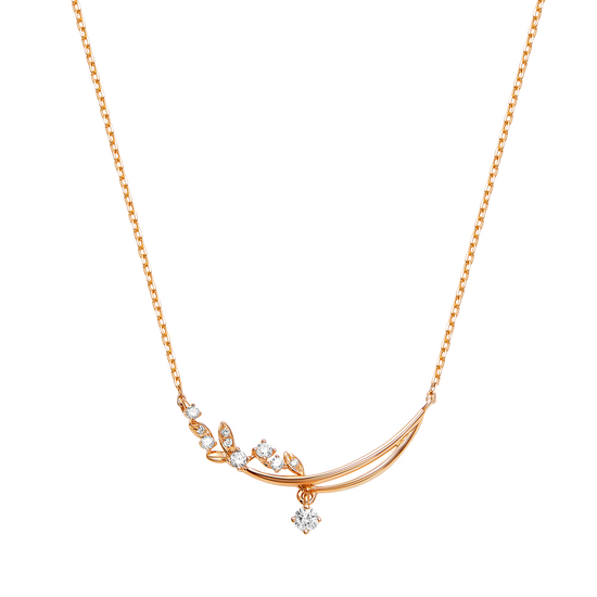 Gold necklace with diamond pendant on a white background