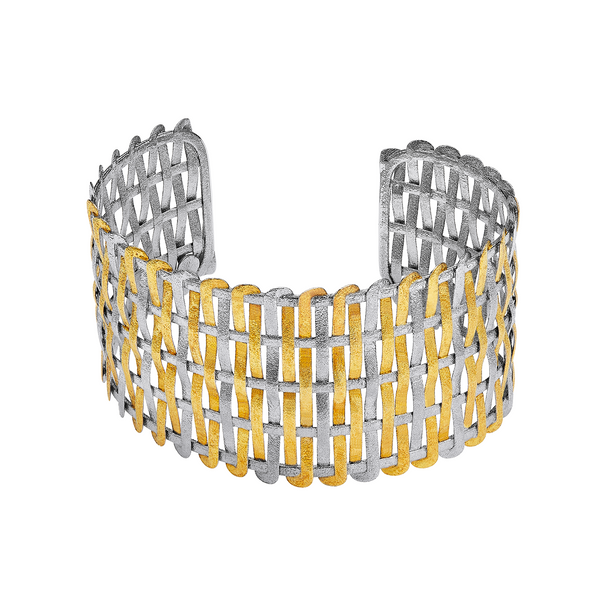 Two-tone bracelet with silver and gold woven design on a white background